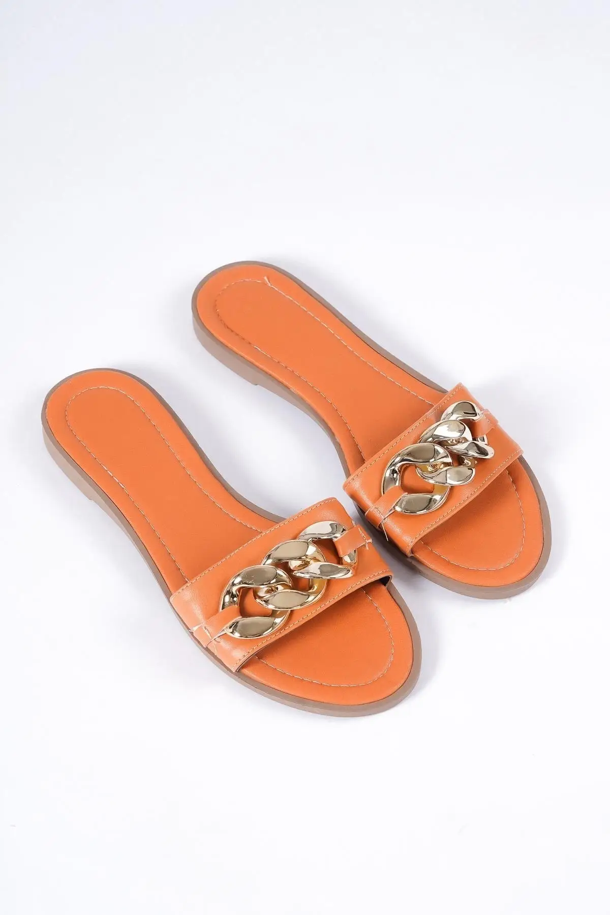 

Orange chain detailed flat slippers