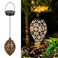 outdoor lantern hollowed out iron art light control water drop shaped solar operated garden projection light lamp for pathway