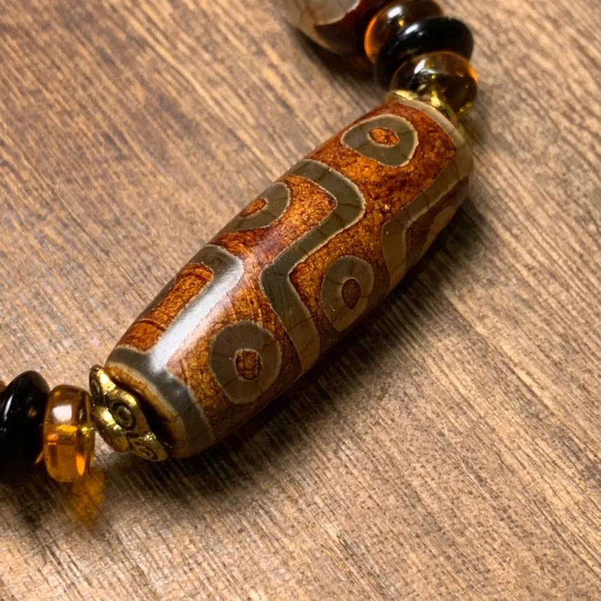 Тибетские старые бусины Дзи девять глаз три глаза состаренная целлюлоза браслет