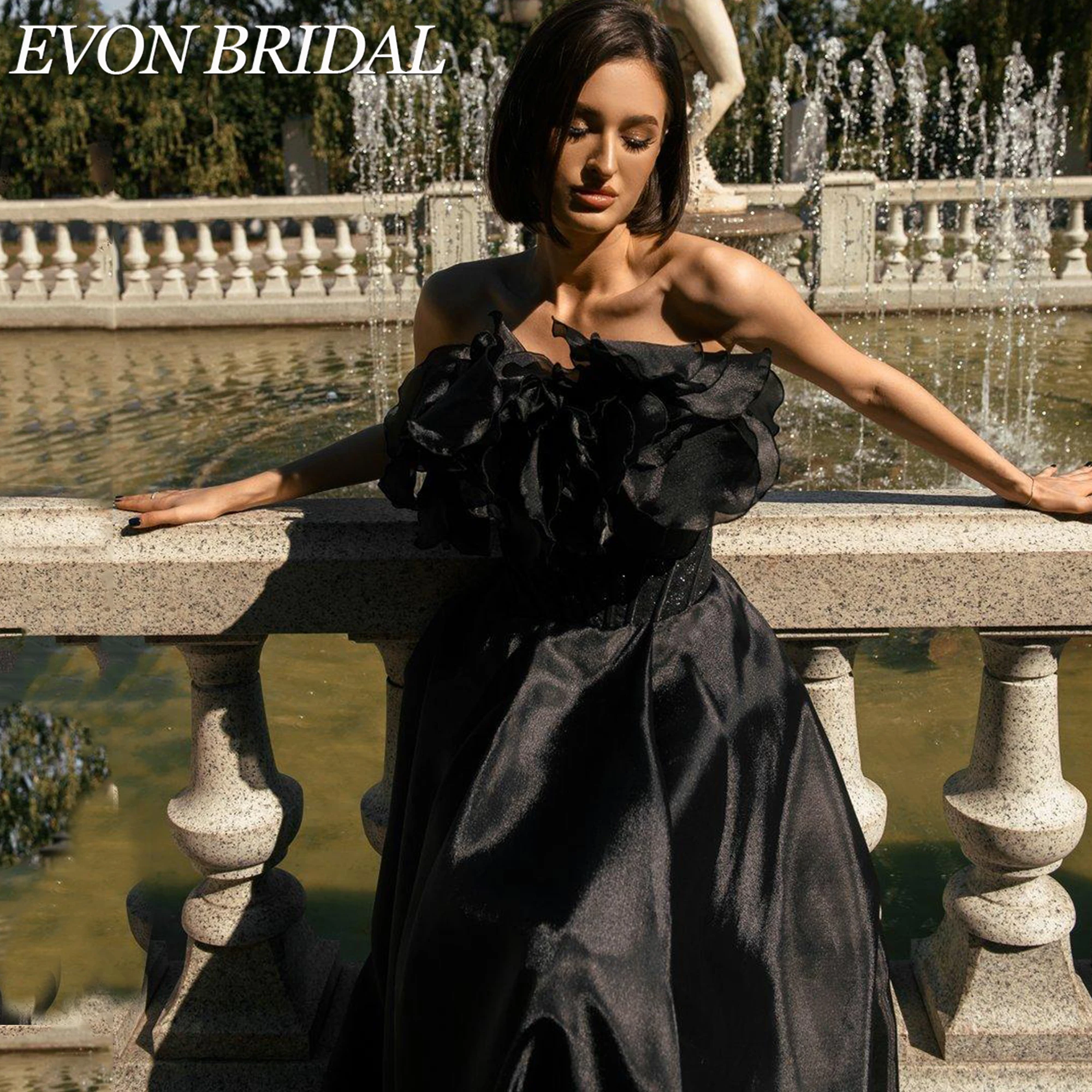 Фото EVON BRIDAL Элегантное вечернее платье без бретелек корсет из органзы с объемными цветами для гостя свадьбы коллекция 2026 на заказ легкая воздушная силуэт объемные цветочные декоры полупрозрачная ткань с уникальной №4