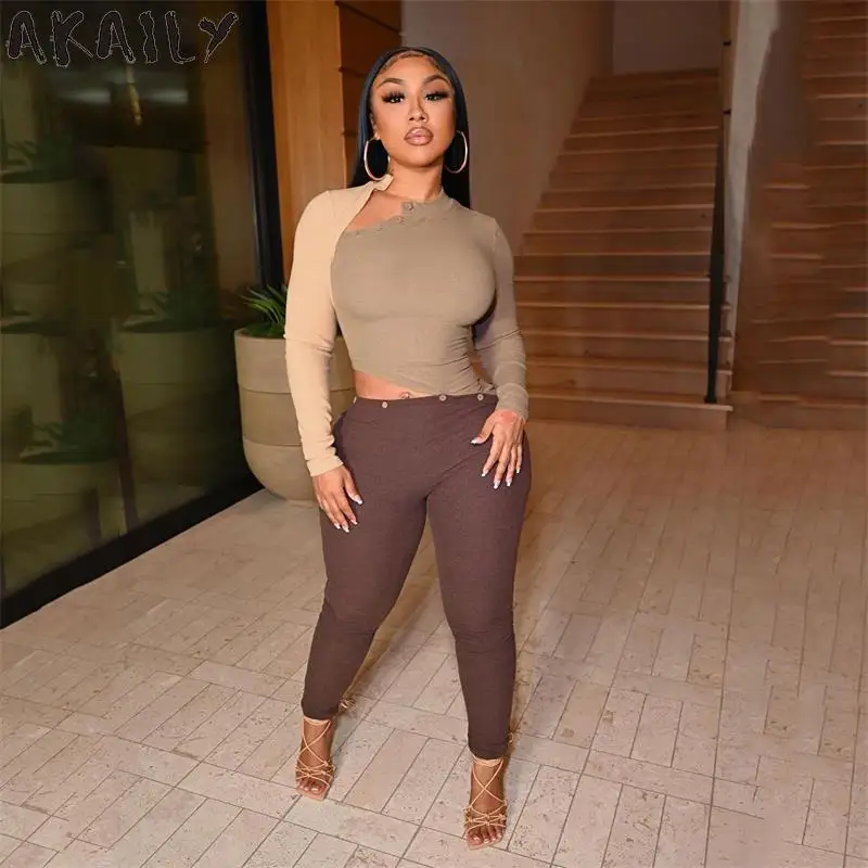 

Осенний черный комбинезон Akaily в стиле пэчворк, уличная одежда, Цельный Наряд для женщин 2021, Облегающий комбинезон на пуговицах с длинным рук...