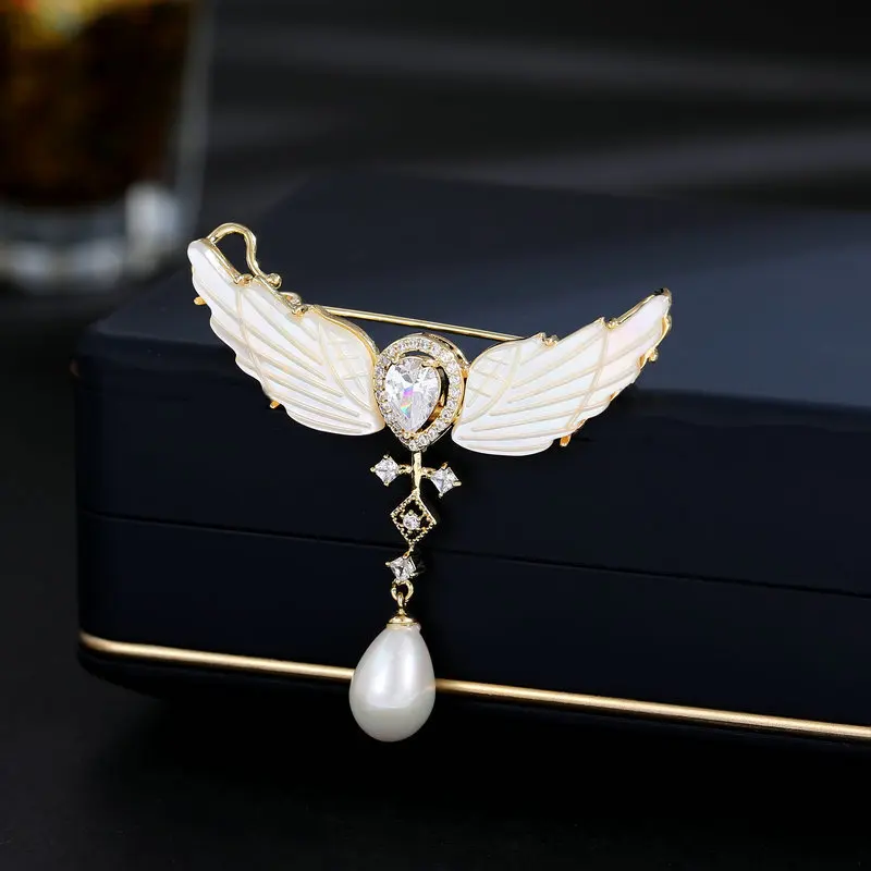 

Korean Rhinestone Angel Wings Love Heart Brooches for Women Personality Pearl Waterdrop Pendant Lapel Pins Lovely Corsage Buckle