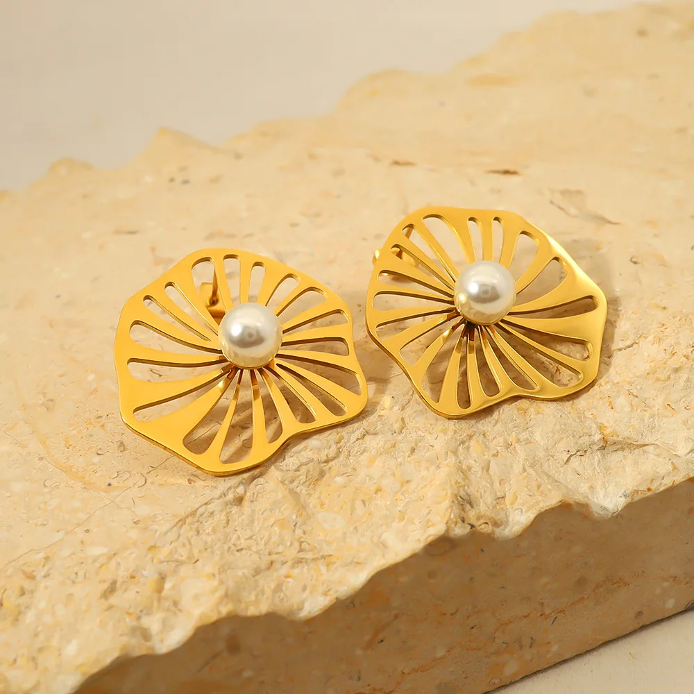 

European and American simple hollow lotus leaf pearl titanium steel earrings female temperament senior sense earrings