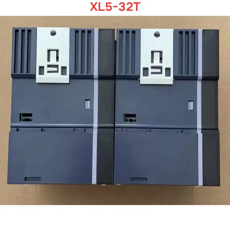 Фото Б/у программируемый контроллер XL5-32T, проверен, исправен, функциональность сохранена. Последняя цена на июнь 2026 года. №1