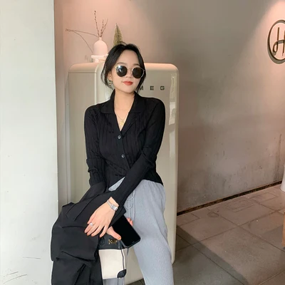 

A Coat women's long-sleeved pure desire knitted sweater women's design sense niche slim and thin long-sleeved top