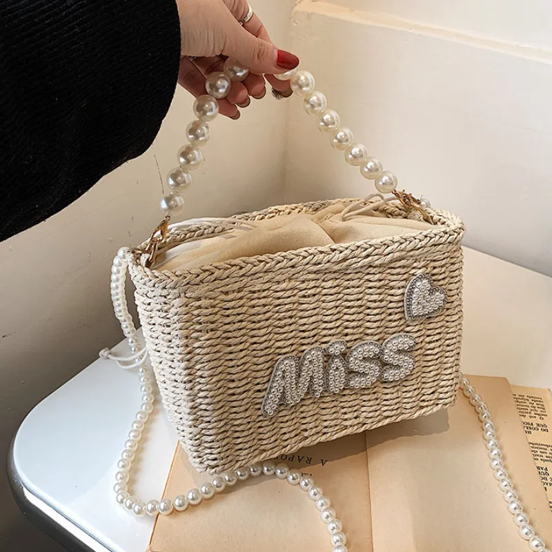 

Summer Straw Bag for Women 2023 New Beach Fashion Shoulder Bag Woman Pearl Chain Party Letter Cute Woven Tote bag