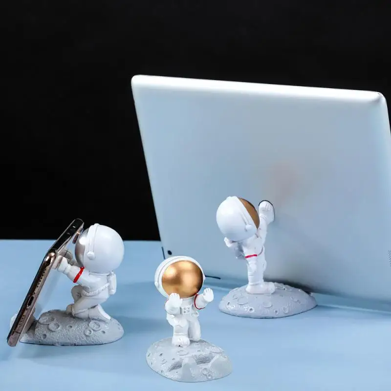 

Resin Astronauts Ornaments Universal Cell Mobile Phone Stand Holder Spaceman Bracket Toys Home Office Desk Decor Birthday Party