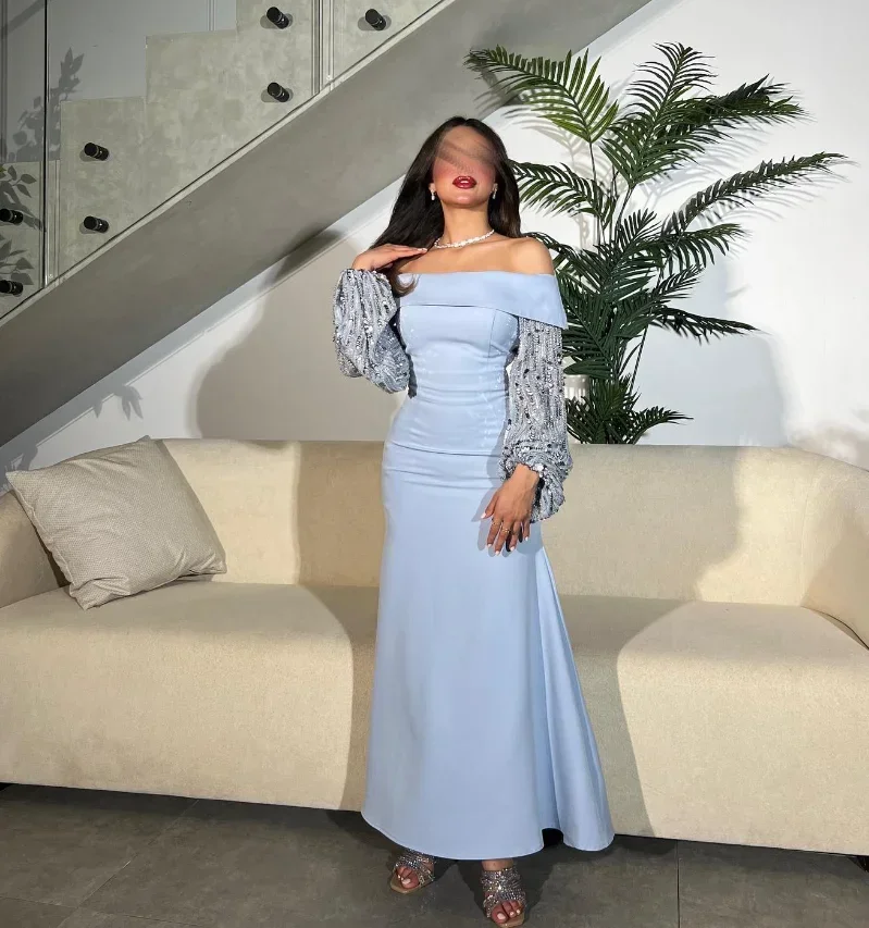 Женское вечернее платье голубое с бусинами