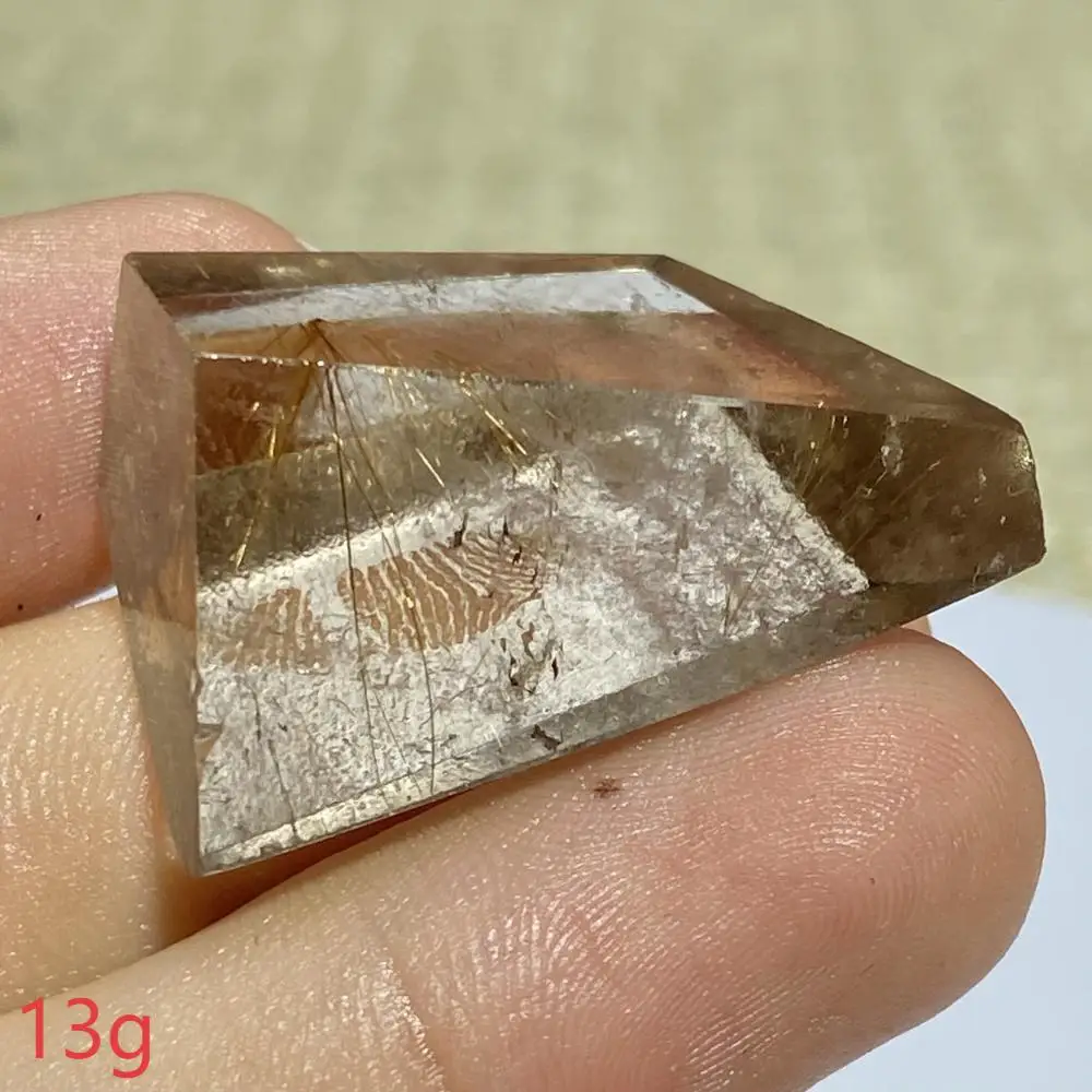 

Рутилированный кварцевый кристалл с золотом