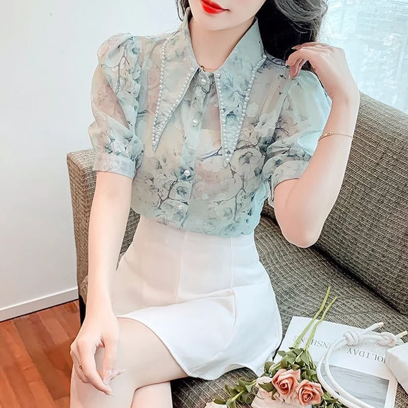 

High -grade beaded chiffon blouse female 2022 summer latest foreign gas print bubble bubble sleeve wild shirt blouse women's top