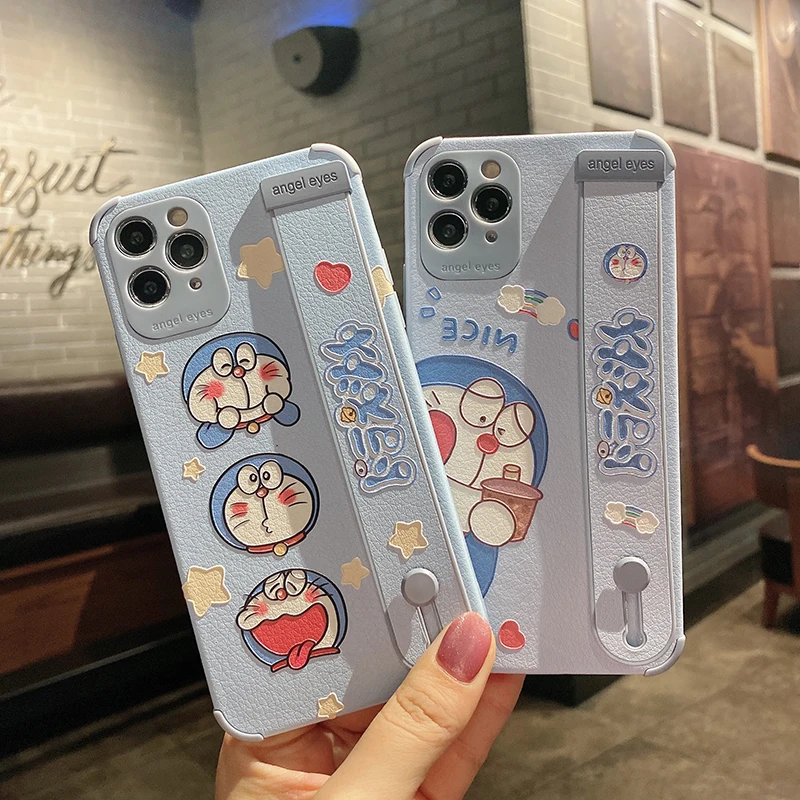 

BANDAI Cartoon Doraemon Wrist Strap TPU Phone Case for iPhone 11 12 13 Pro Max 7 8 Plus X XR XS MAX Hand Band Cases Soft Relief