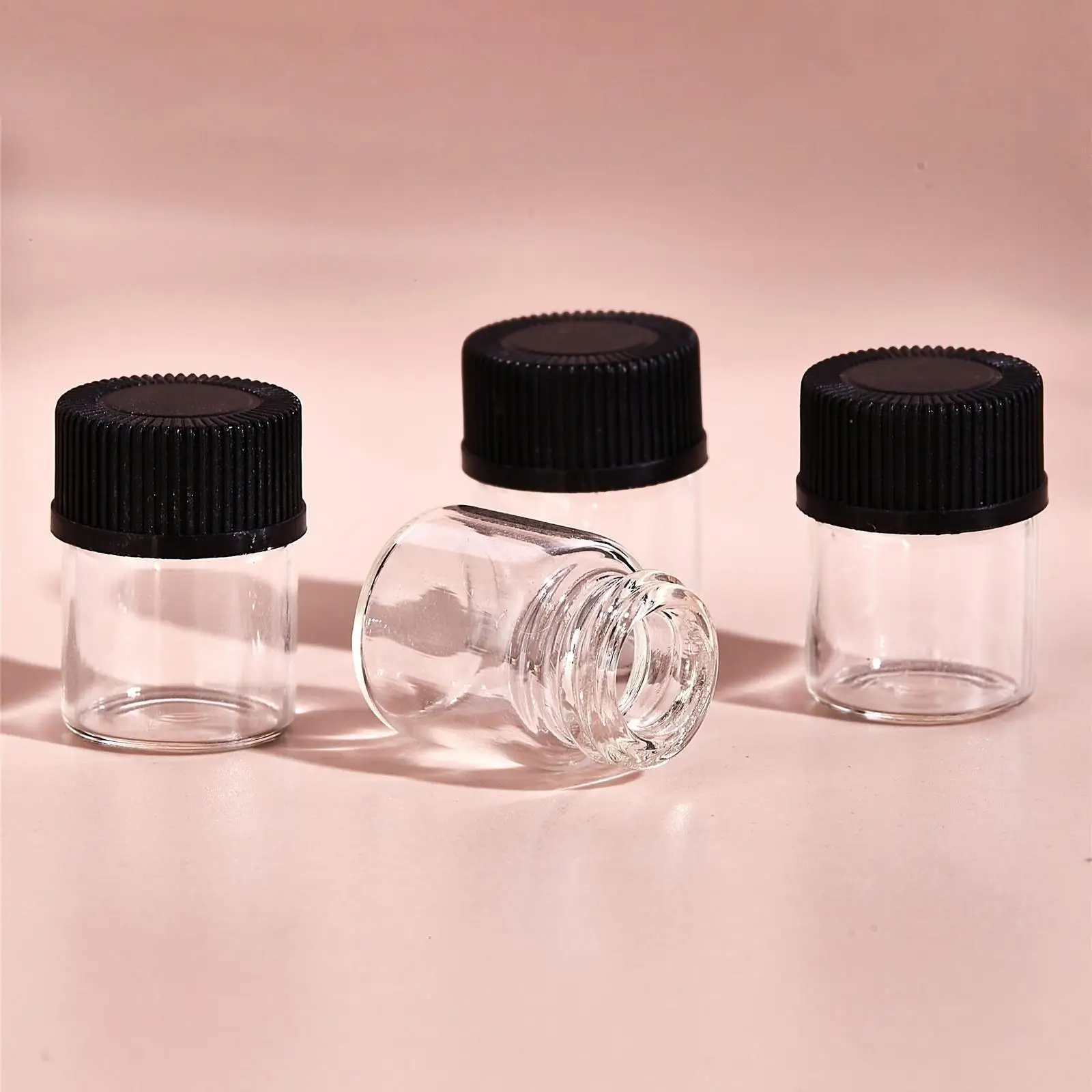 

100Pcs Essential Oil Bottles Refillable with Orifice Reducers for Massage