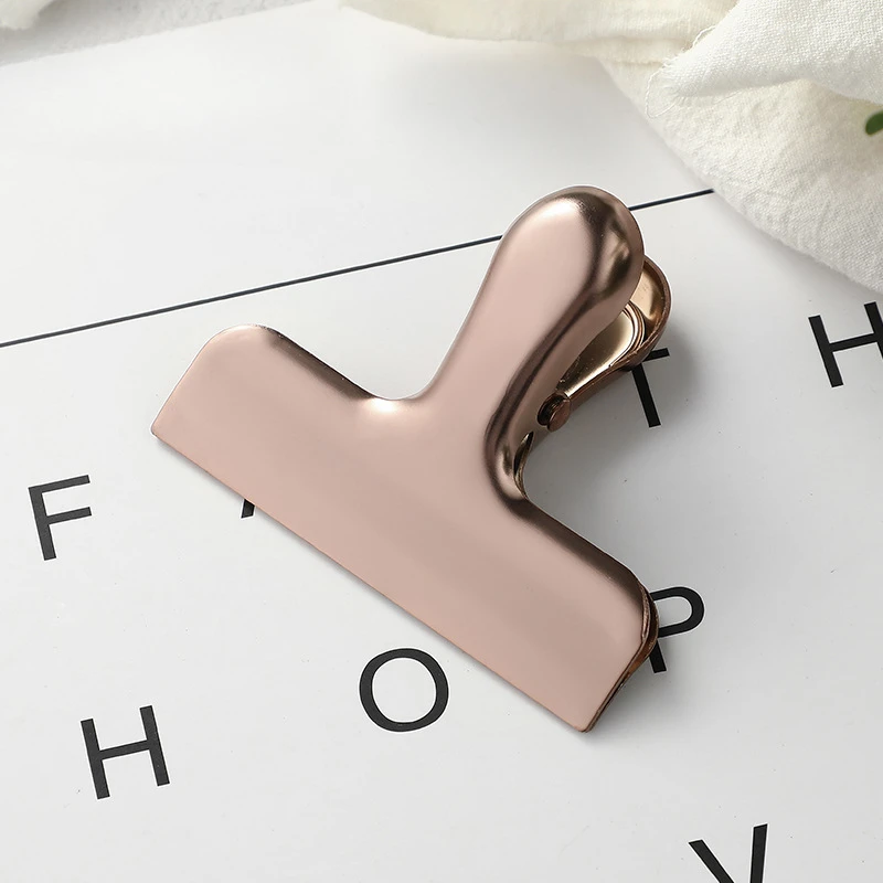 

Металлический зажим для бумаг