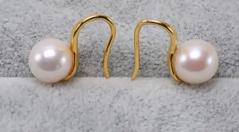 

Charming 7-8mm White Round Cultured Freshwater Pearl Earrings 925 Sterling A