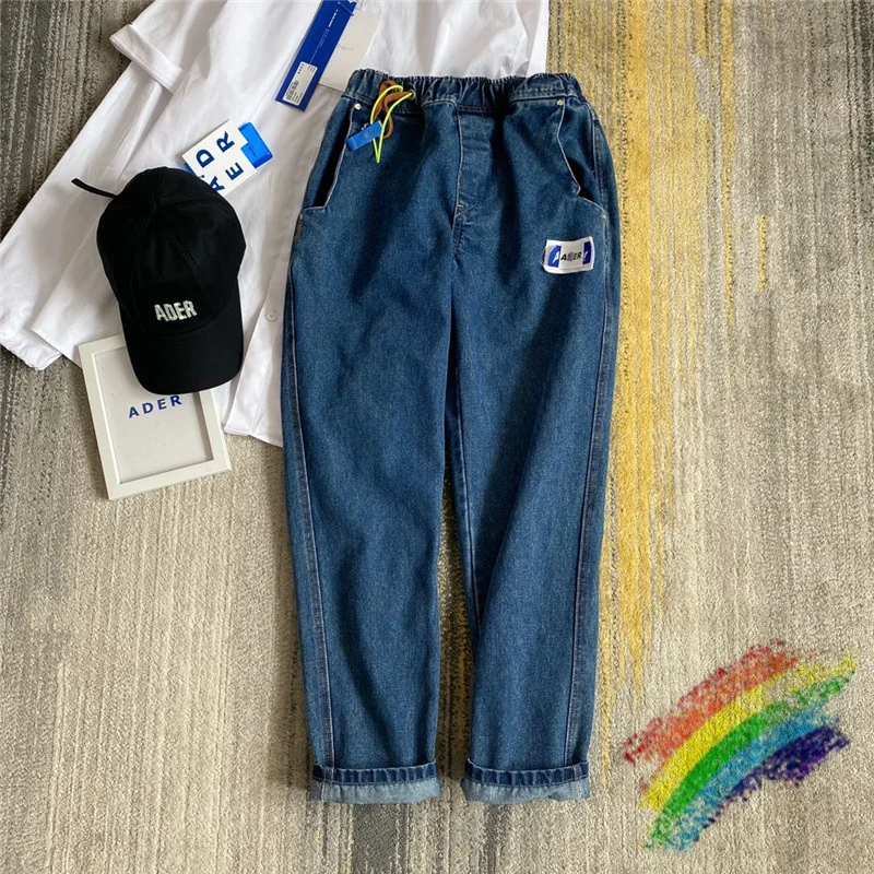 

Destroy Adererror Jeans Men Women 1:1 High Quality Ader Patch Label Adererror Cinder Pants Broken Back Pockets Trousers