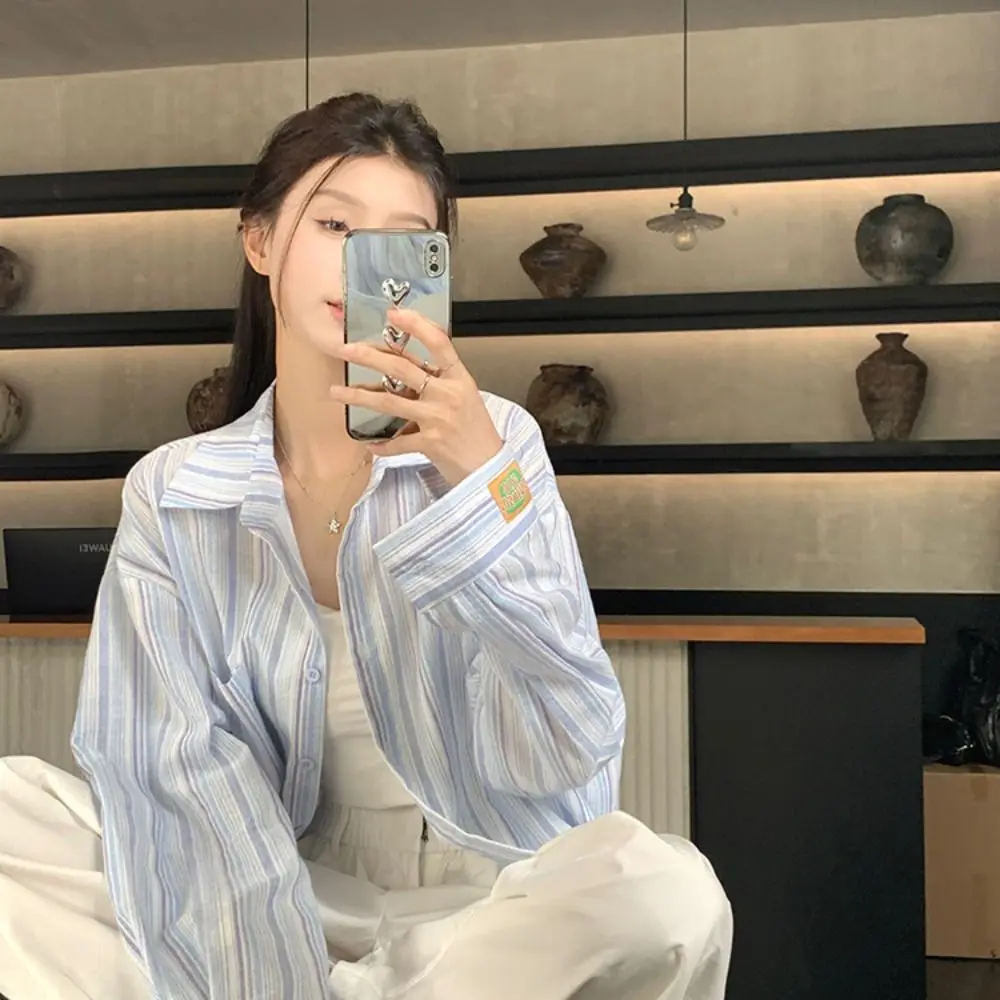 Блузка в розовую полоску с длинным рукавом и отложным воротником