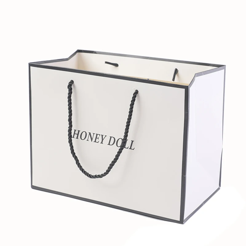 

Wholesale 500pcs/lot White Paper Shopping Bags Gift Packaging Cloth Bag With Handle Custom Logo