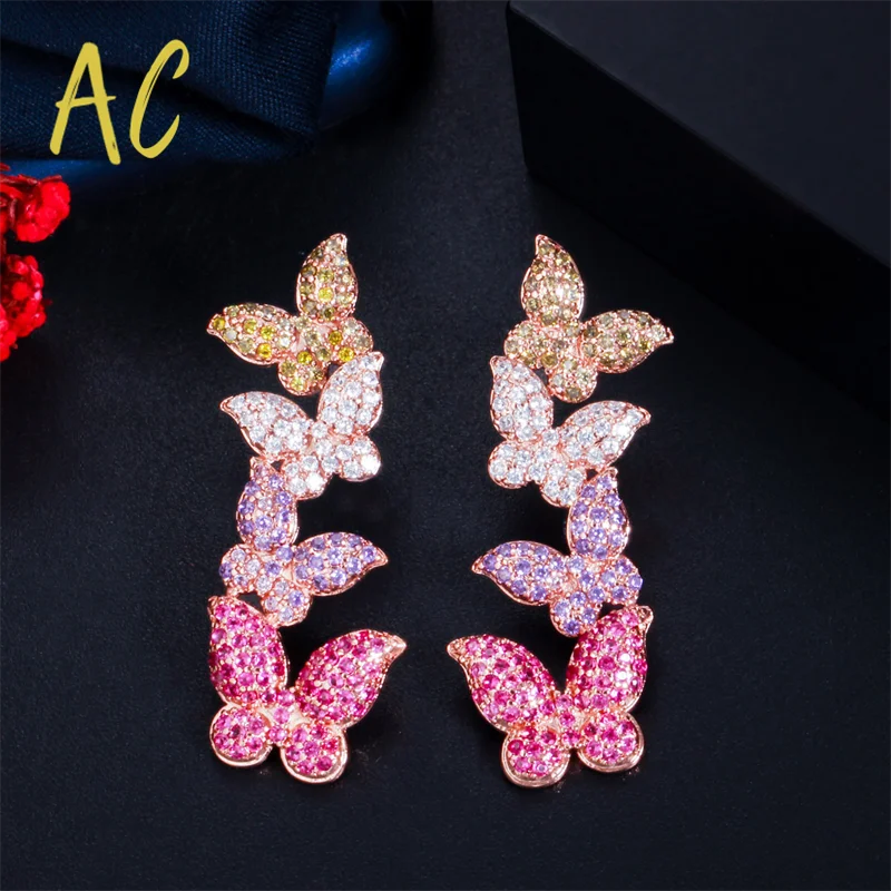 

Элегантные серьги розового золота фиолетового и красного цвета с кубическим цирконием три бабочки висячие серьги для женщин модные ювелир...