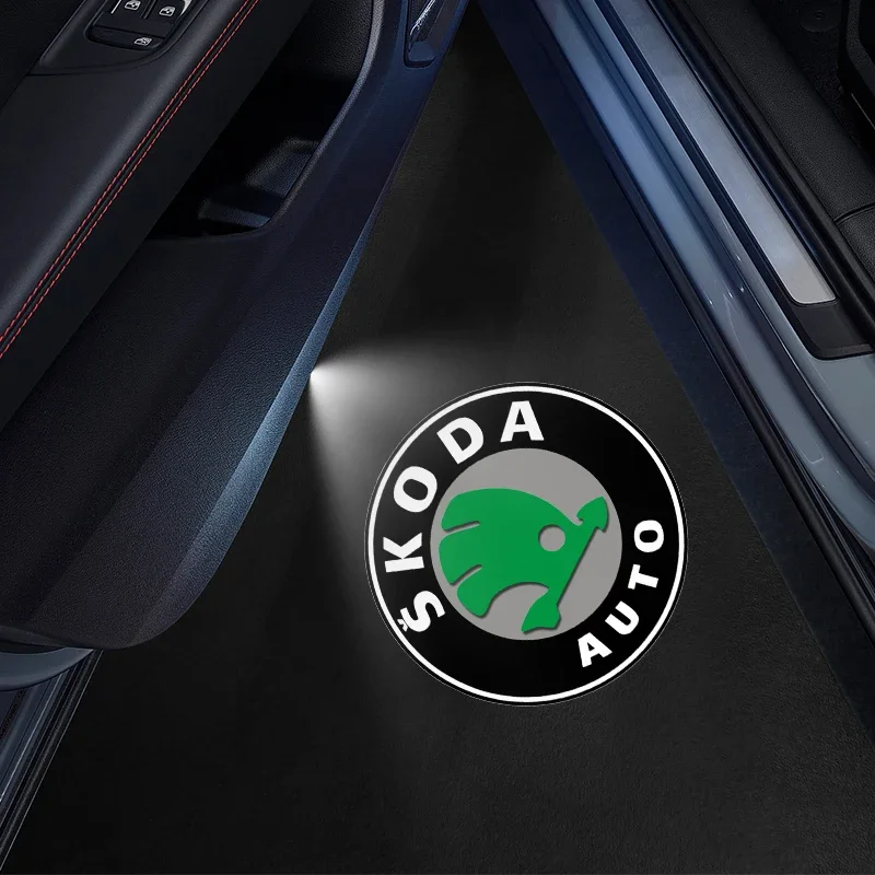 Фото Новинка 2026: Горячая продажа! Наклейки для автомобилей Skoda (RAPID, FABIA, YETI), колпачки для клапанов, светодиодные логотипы на двери автомобиля, лазерные проекторы приветствия. №3