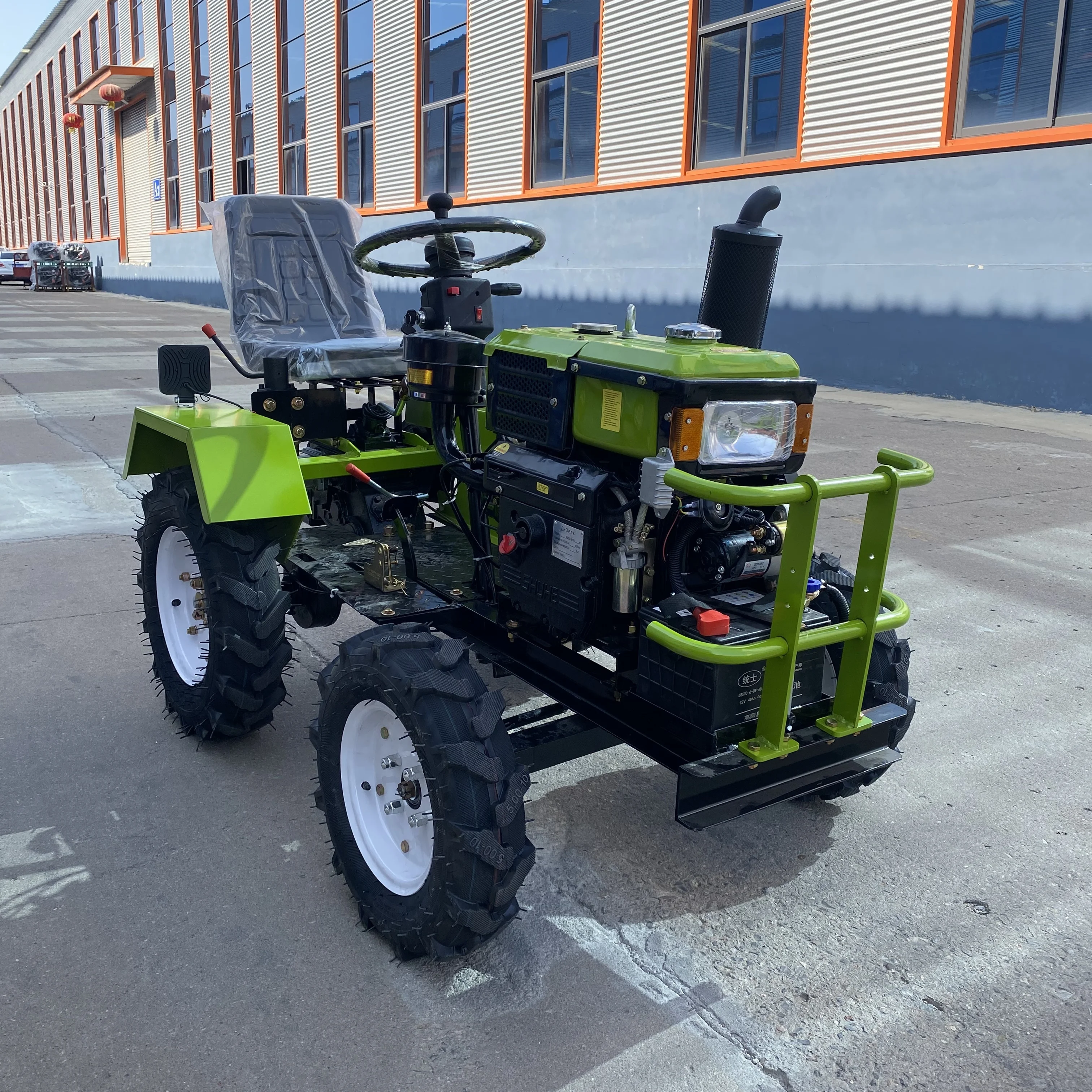 Фото Компактный мини-трактор 4WD с дизельным двигателем, полноприводный (4x4) для небольших ферм и садов №1
