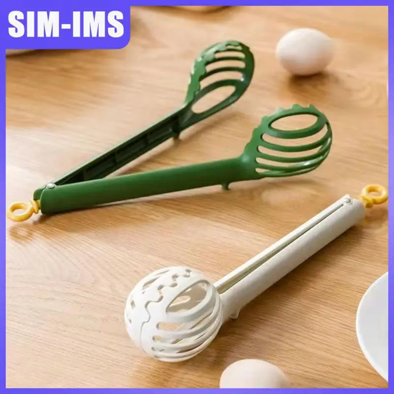 

Multifunctional Long Handle Manual Egg Beater Heat Resistant Kitchen Egg Clip Noodle Non-stick Imitation Sawtooth Design
