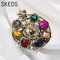 skeds luxury women lion head crystal brooches pins creative colorful rhinestone badges vintage party brooch pin accessories gift