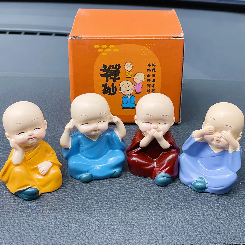 

Car accessories cute doll car interior decoration decoration car decoration creative four not small monk Buddha to keep safe