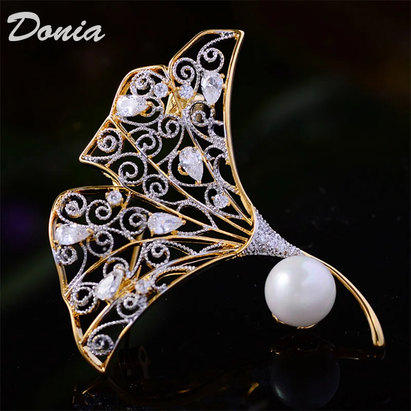 

Donia jewelry European and American fashion brooch plating two-color gold accessories leaf brooch fashion atmosphere leaf brooch