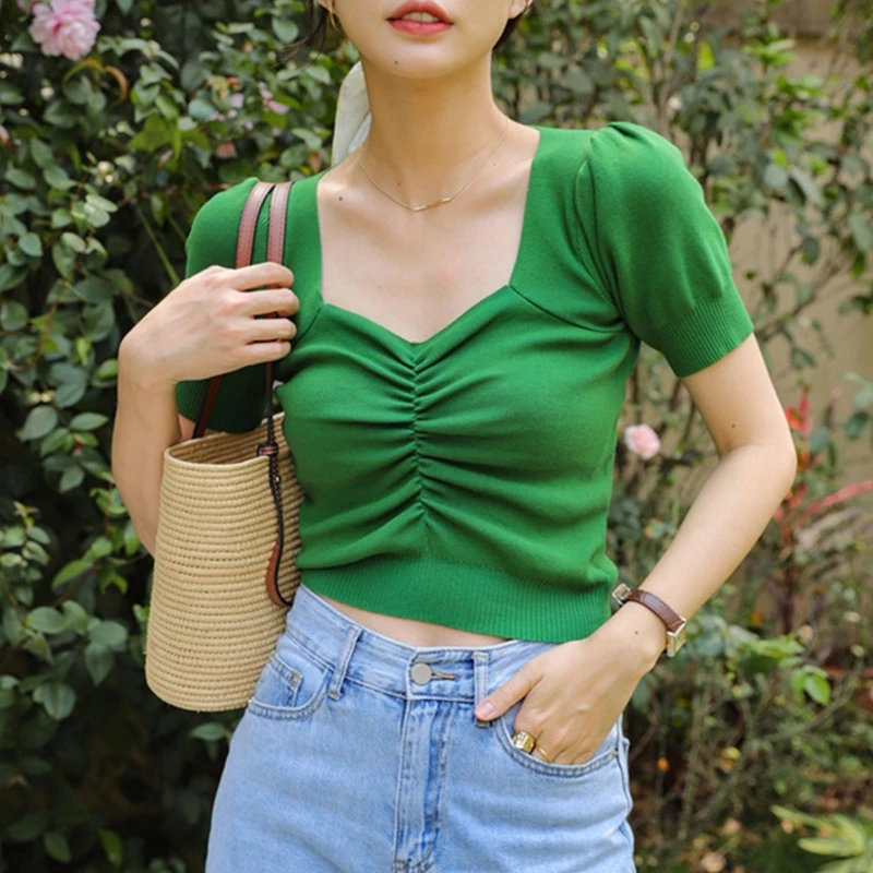 

Женская футболка с коротким рукавом и V-образным вырезом