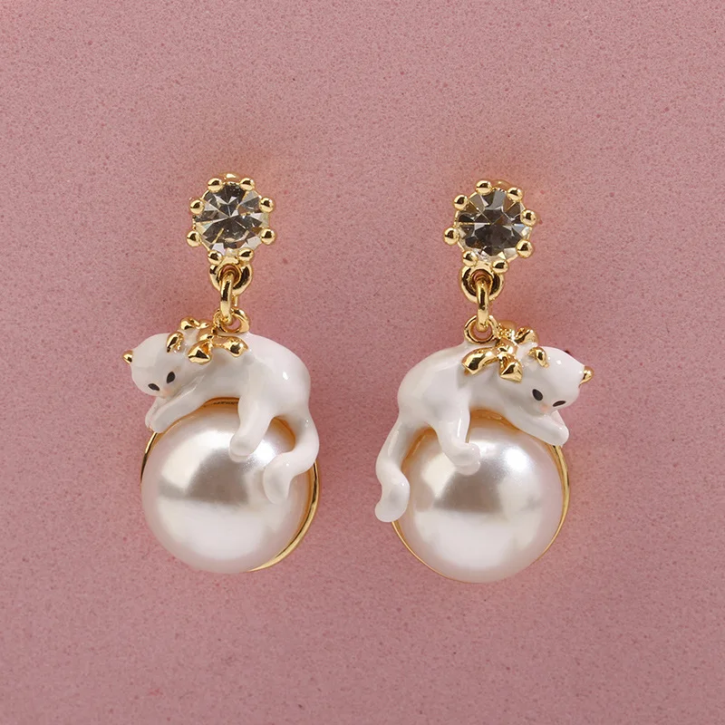 

Cute temperament Joker hand-painted enamel animal rabbit earrings European and American fashion gold-plated ear