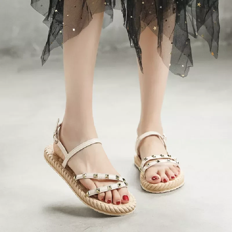 

NEW IN sandals female tourist hemp base outside Korea tide flat wear flat beach rivet wholesale fashion cool slippers