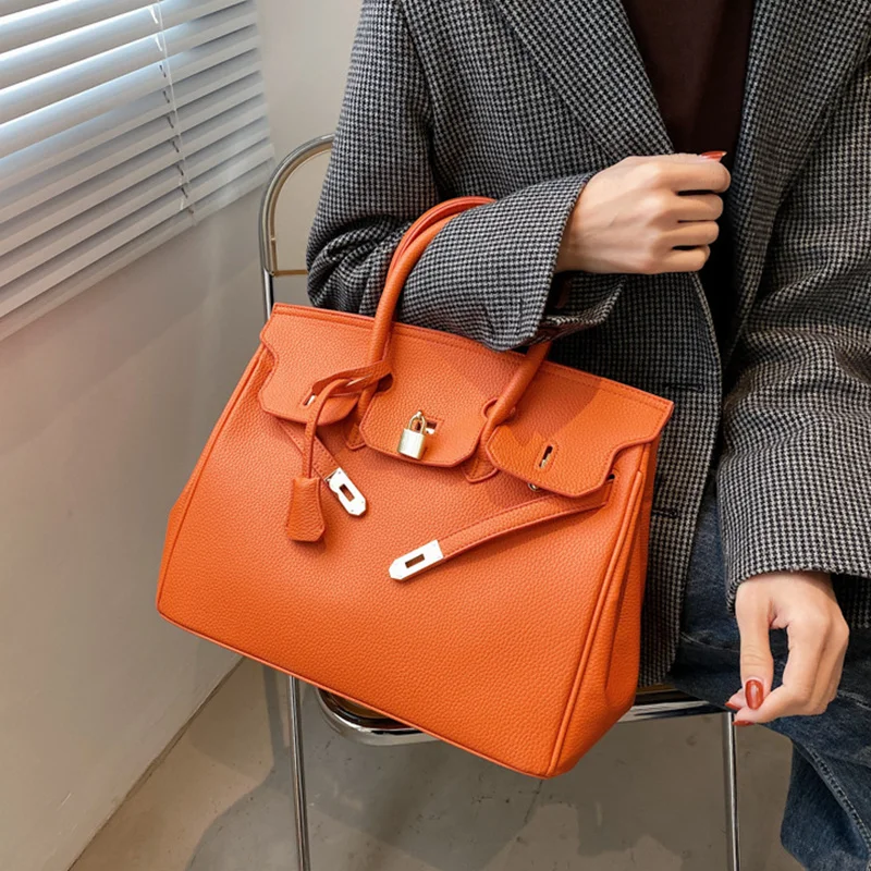 

Роскошная классическая платиновая сумка, однотонная вместительная кожаная сумка-тоут с замком, женская сумка-мессенджер на плечо, новинка ...