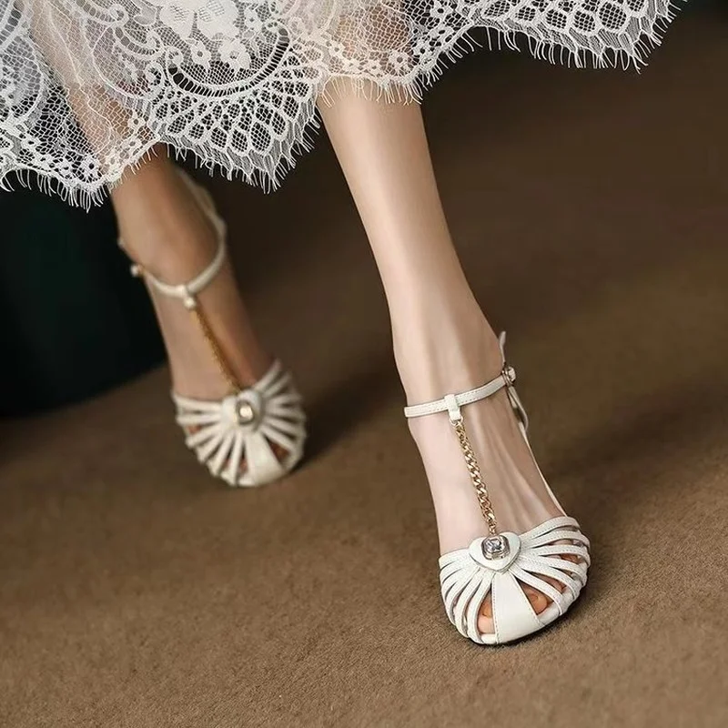 

Roman Sandals Women's 2022 Summer New Fashion Temperament Hollow Rhinestone Women's Classic Design Word Buckle High Heels