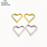 a pair of g23 titanium heart earrings set with a half ring zircon simple slit body piercing earrings gift