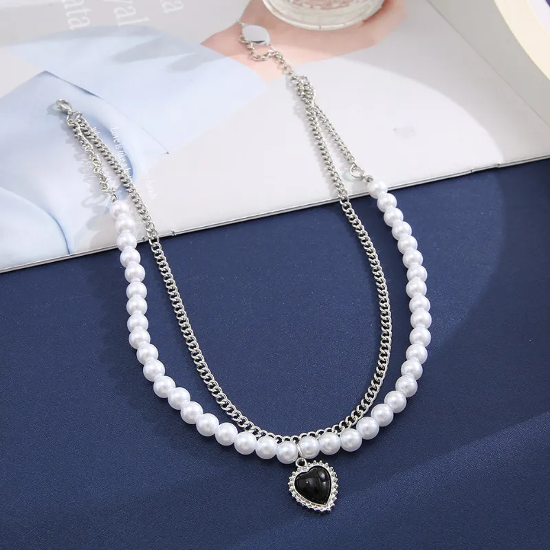 

Women Vintage Pearl Chain Heart Pendant Necklace Simple Clavicle Chain
