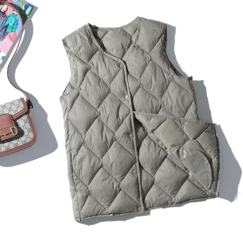 Женский ультратонкий пуховик в корейском стиле с теплой подкладкой и застежкой