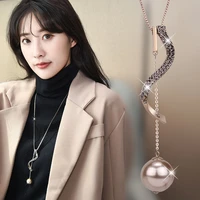 new fashion long pendant necklace female geometric pearl sweater chain high end luxury inlaid zircon crystal necklace jewelry
