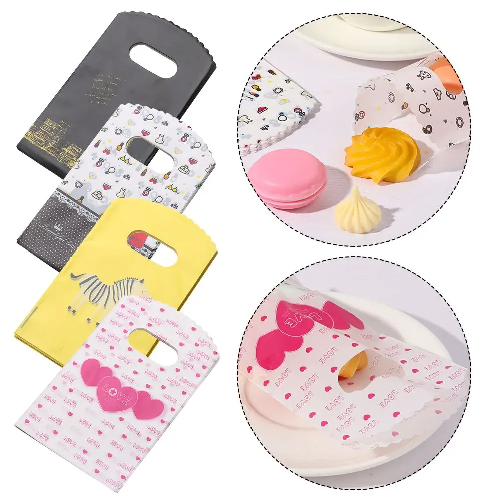 

50Pcs/Lot Multi Designs Durable Simple With Handles Boutique Gift Bag Storage Pouch Packaging Bags Plastic Bag