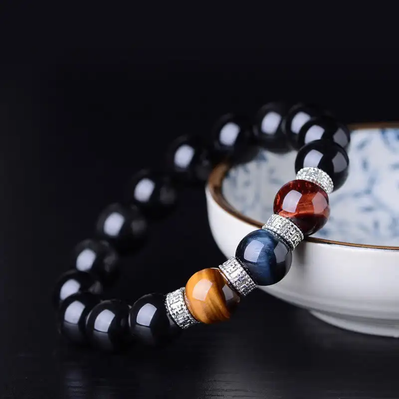 

Release Negativity Black Obsidian Tricolor Tiger Eye Strength Bracelet