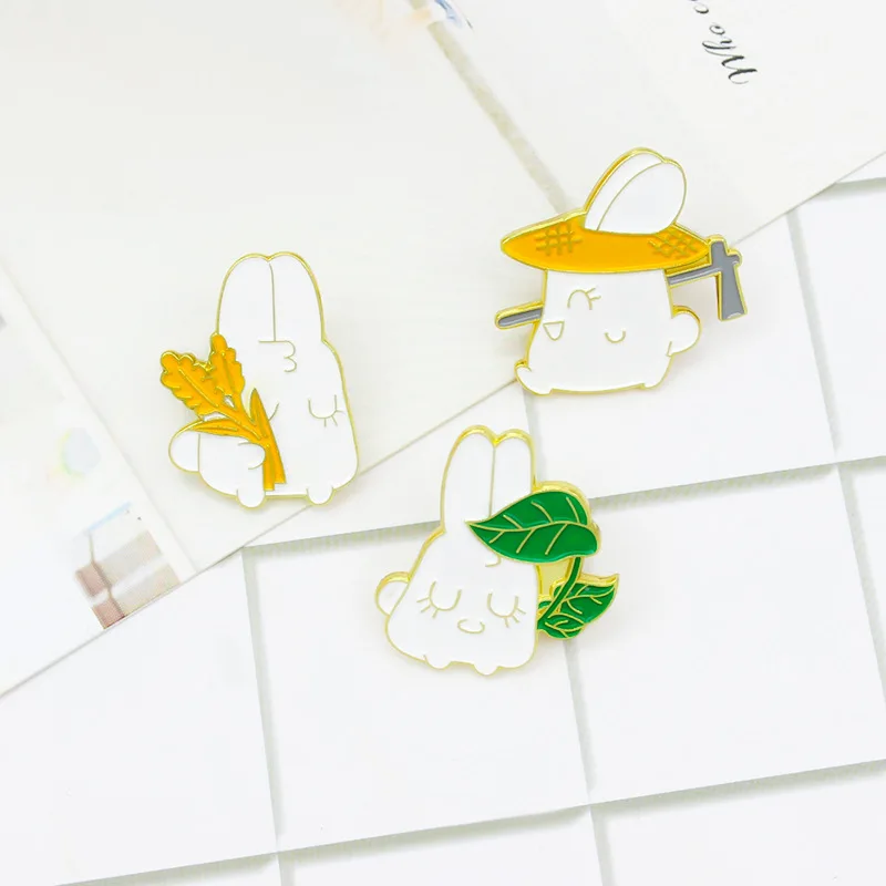 

Cartoon cute hardworking rabbit brooch Rabbit holding a hoe brooch Rabbit golden wheat ear brooch Cartoon bunny brooch