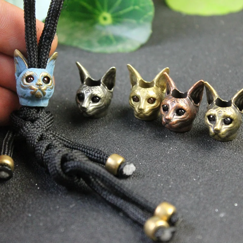 

Red Eye Egyptian Cat Head Knife Bead DIY Paracord Woven Lanyard Pendant Jewelry Accessories EDC Outdoor Tool Umbrella Rope Charm