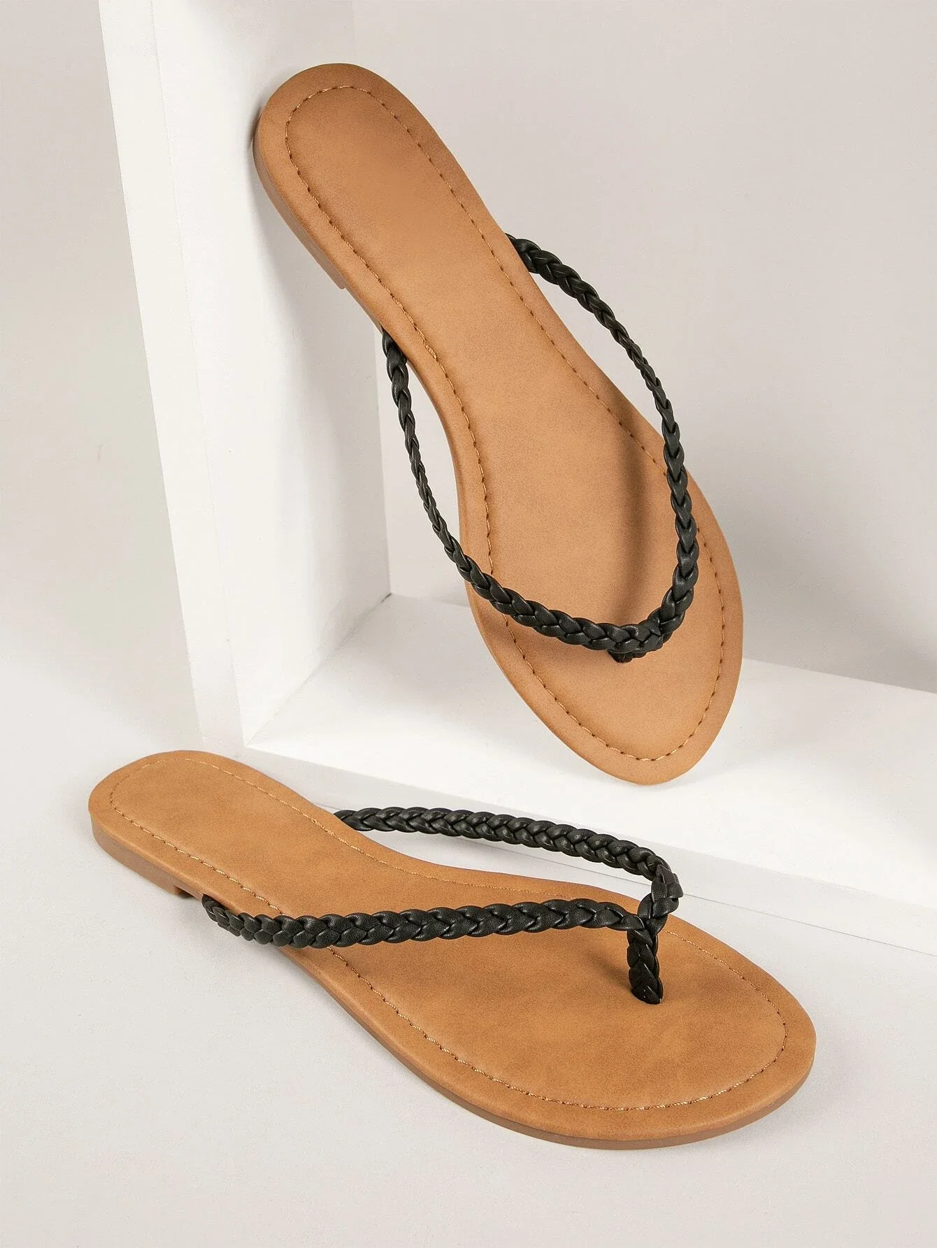 

Braided Faux Leather Toe-Thong Flip Flops