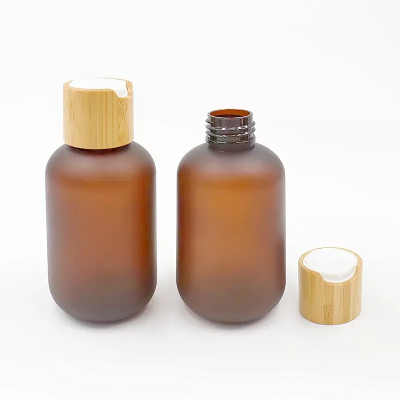 

Wholesale 60/120/250/500ml PET Plastic Amber Frosted Empty Lotion Toner Bottles with Bamboo Caps Makeup Cosmetic Travel Bottle