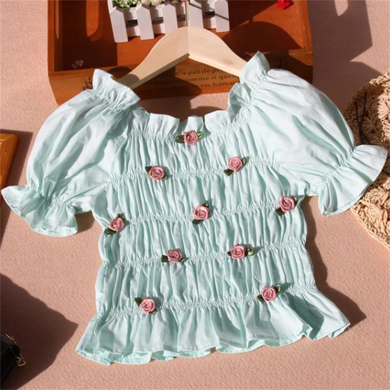 

Girls' lotus leaf doll shirt 2022 summer new children's three-dimensional flower puff sleeve short-sleeved children'