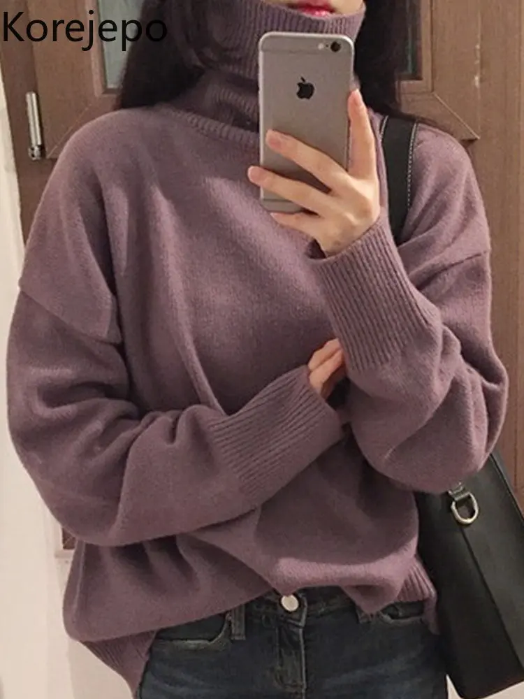 

Свитер женский осенне-зимний однотонный с высоким воротником