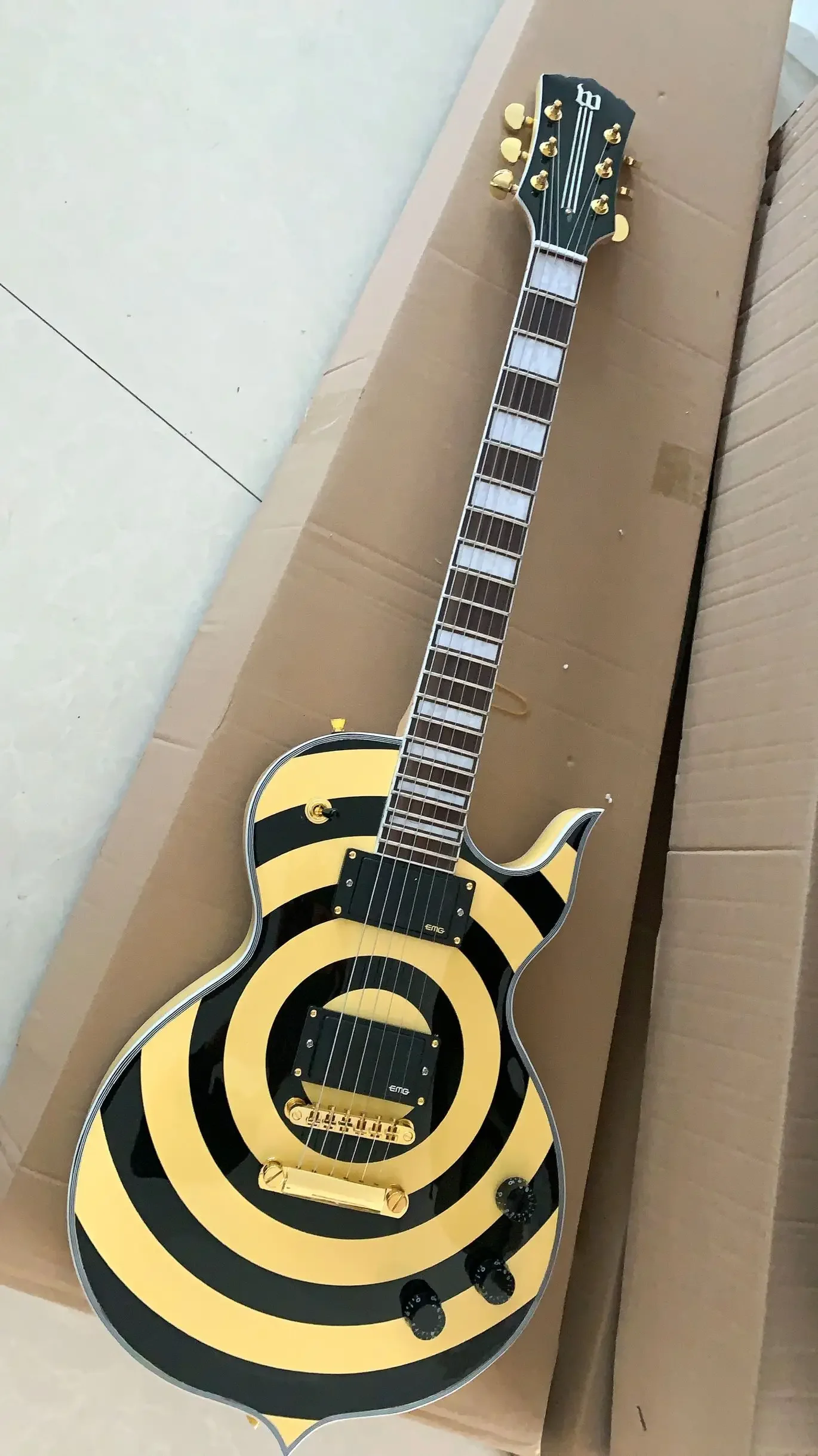 

Wylde аудио Odin Grail Gangrene желтый кремовый черный Bullseye электрическая гитара большая блочная инкрустация, золотая фурнитура, копия EMG Pickups