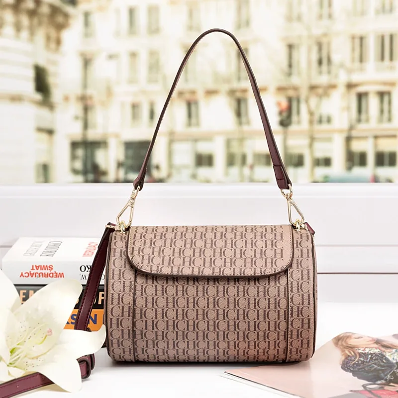 

Роскошный бренд 100% кожаная Высококачественная Новая модная женская Универсальная Ретро сумка-цилиндр с буквами CH сумка на плечо Gg кошельки...