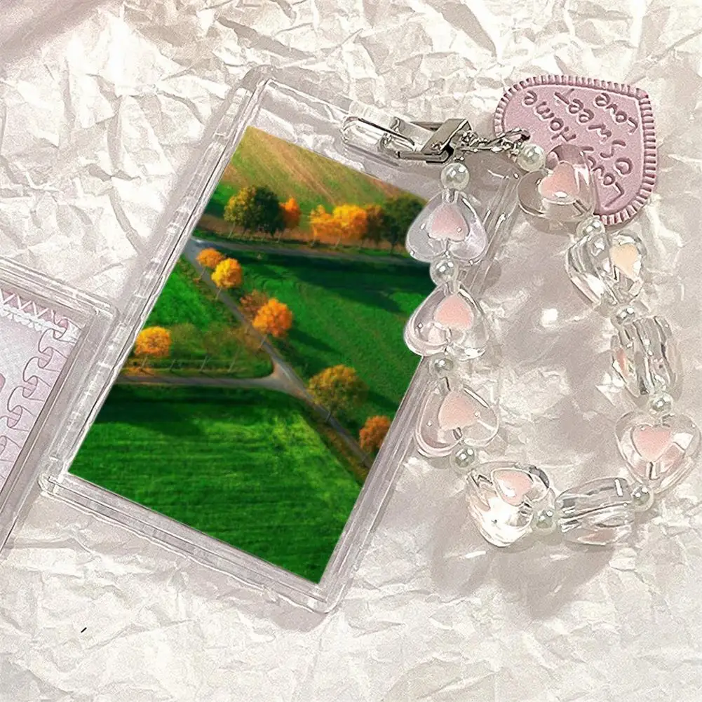 

Прозрачный защитный ремешок на запястье с подвеской в виде сердца