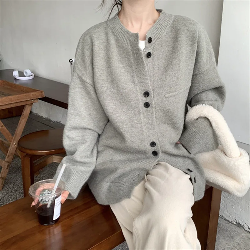 

Autumn and winter new cardigan women loose lazy wind casual solid color sweater coat.