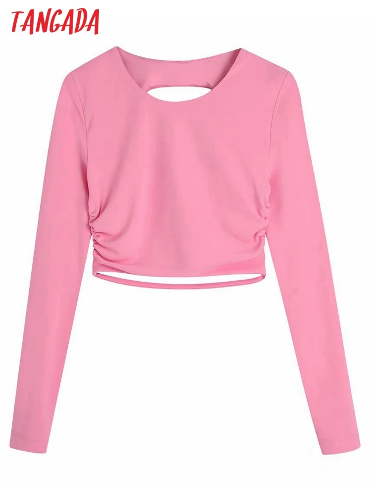 

Женская укороченная блузка с открытой спиной и длинным рукавом